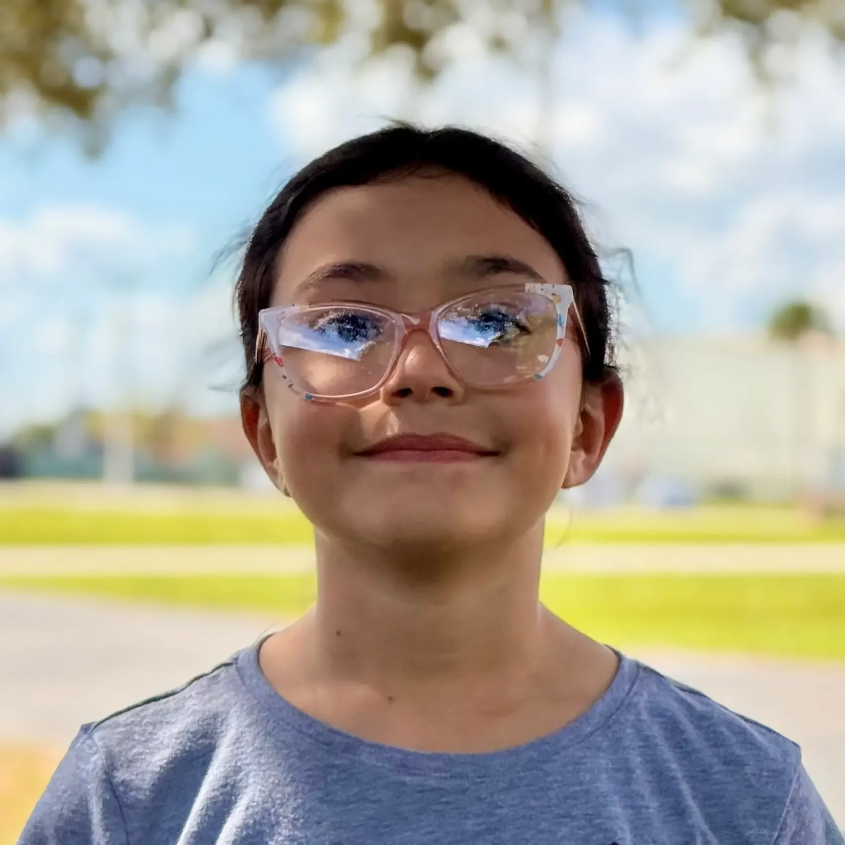 Student smiling at camera